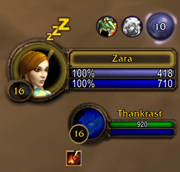 In-game: beside the player frame