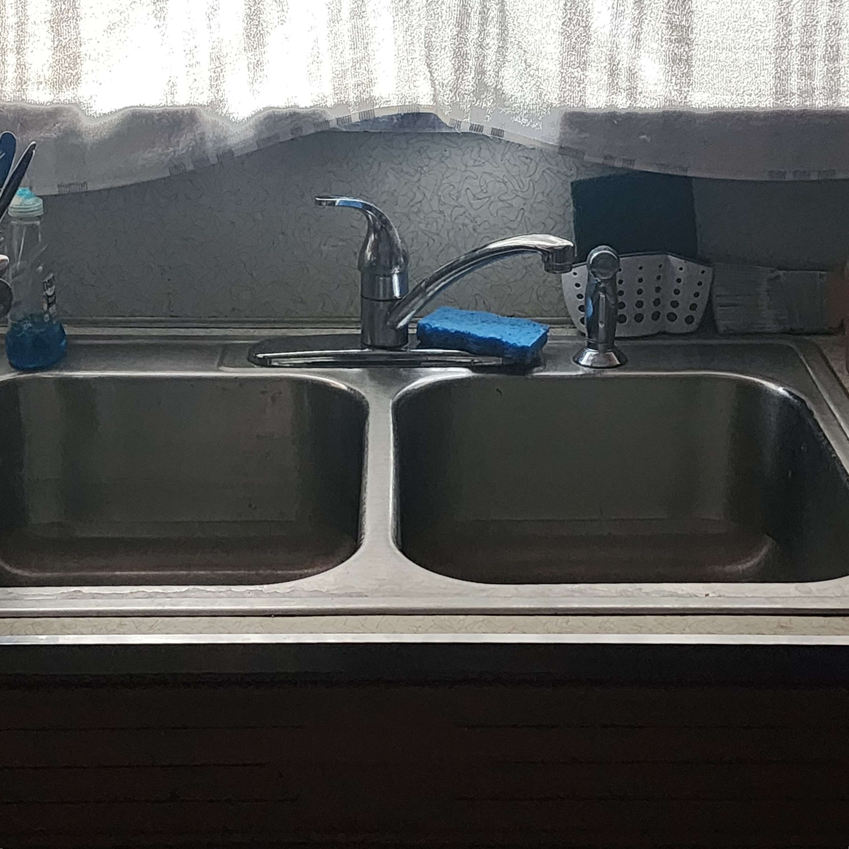 Godzillawarz's Kitchen Sink logo