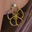 Flower Drop Earrings logo