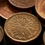 SimpleUnfoldingCurrency logo