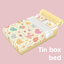 Tin box bed logo