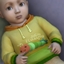 Caterpillar Infant Sweater logo