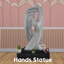 Hands Statue logo
