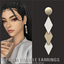 GoldFish Prism Dangle Earrings logo