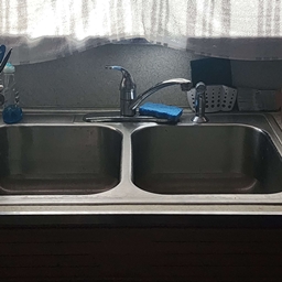 Godzillawarz's Kitchen Sink logo
