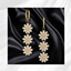 Daisy Dangle Earrings logo