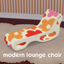 Modern lounge chair logo