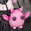 Squishy Bat Bag and Backpack logo