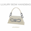 Luxury Bow Handbag Decor logo