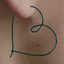 Heart Hoops Earrings logo