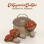 Emdoescc | Cottagecore Clutters Basket & Pillows logo