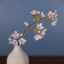 Cherry blossom branches in vase logo
