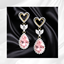 Pink Diamond and Heart Earrings logo