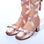 Ruffle Wrap Strap Mules logo