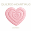 Quilted Heart Rug logo