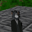 Tom In A Suit Totem logo