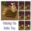 littlbowbub Watering Can Drinks Tray / translation spanish by Monisims logo