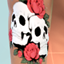 Skull Tattoo with  red Roses Upper Arm Tattoo logo