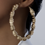 Gold Chunky Hoop Earrings logo