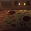 Autumn Bloom Haven Rug Base Game logo