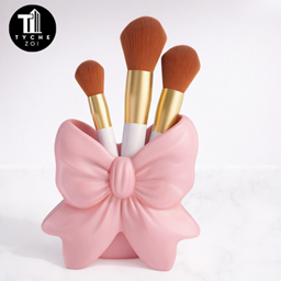 Bow Makeup brush holder logo
