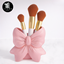 Bow Makeup brush holder logo