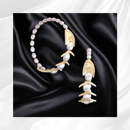 Gold Pearl Fish hoops logo