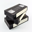 Stacked VHS Tapes logo