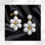 Luna Flower Studs logo