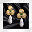 Golden Clover Pearl Earrings logo