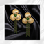 Golden Clover Drop Earrings logo