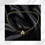 Golden Clover Necklace logo