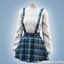 Cozy knit sweater with plaid suspender skirt logo