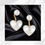 Pearl Heart Earrings logo