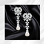 Diamond Bow Earrings logo