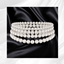 Four Strand Pearl Choker logo