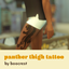 panther thigh tattoo - boocrest logo