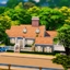 The Coastal - 4 Bedroom by qubedesign logo
