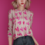 Wendy Knit Sweater logo