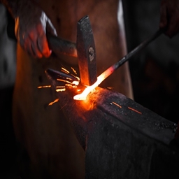 Forged in the Flames logo